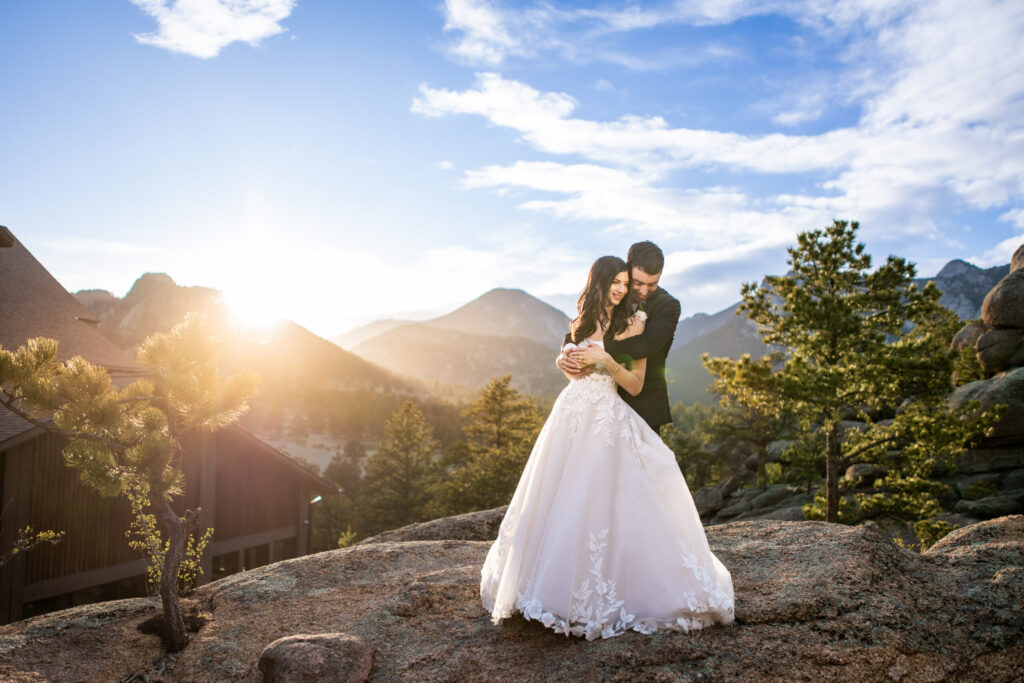 Wedding couple on mountaintop near estes park colorado Colorado Wedding Photographer Colorado Wedding Photographer